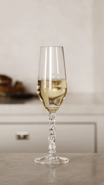 Orrefors Carat Champagne Flutes (8oz): Luminous Elegance by Lena Bergström - DWELL by CM