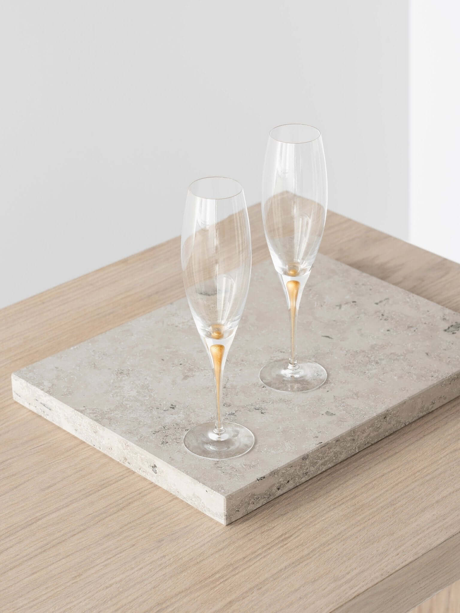 Orrefors Intermezzo Gold Champagne Flutes (7oz): Celebrate in Style - DWELL by CM